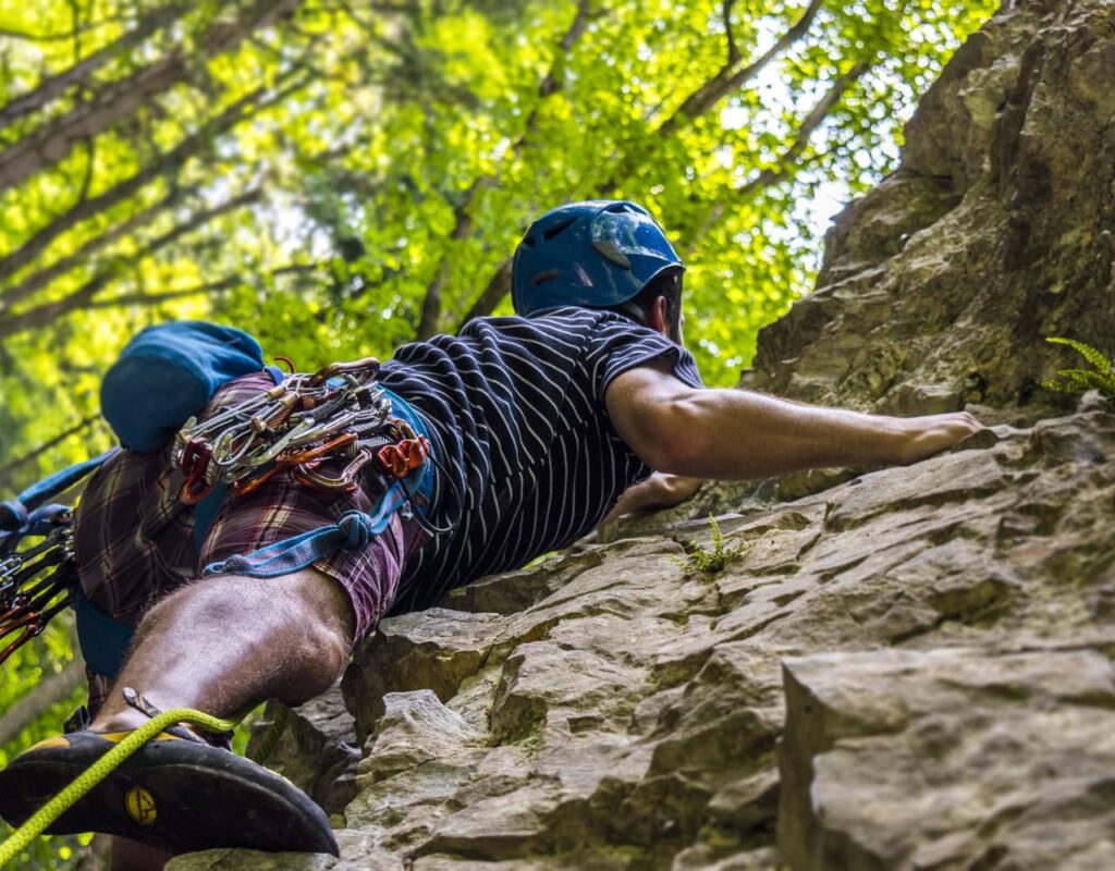 climber embracing the wall with the aim to become a better climber